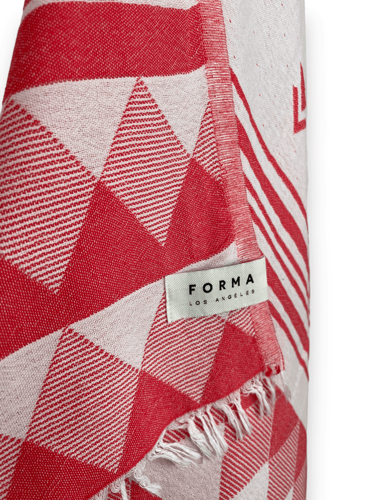 A set of Forma Towels from the Yosemite Collection, showing their soft, absorbent texture, suitable for beach or home use.