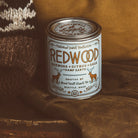 Handcrafted all-natural soy Redwood National Park Candle with the scents of redwood, raspberry, and sandalwood.