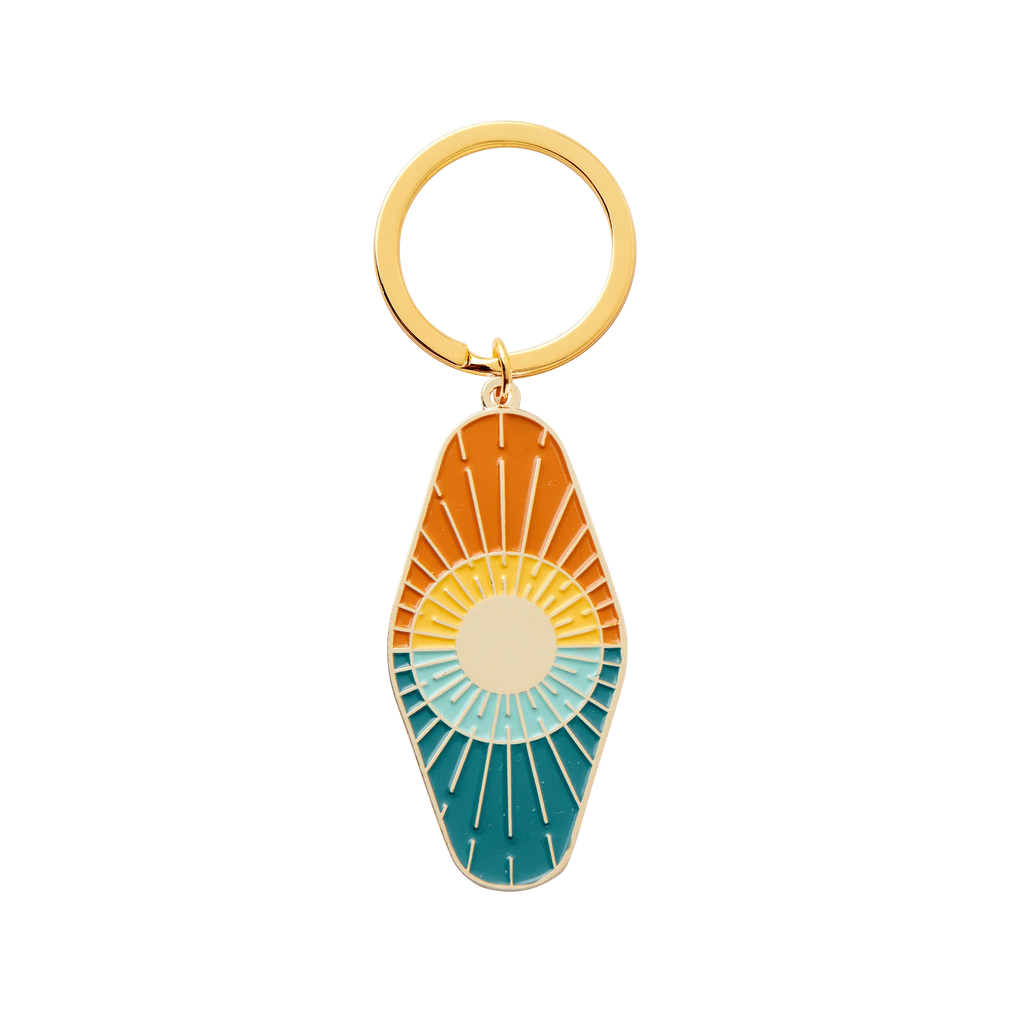 'Sun and Sea Enamel Keychain' made from sturdy enamel, featuring a fun sun-and-sea design"
