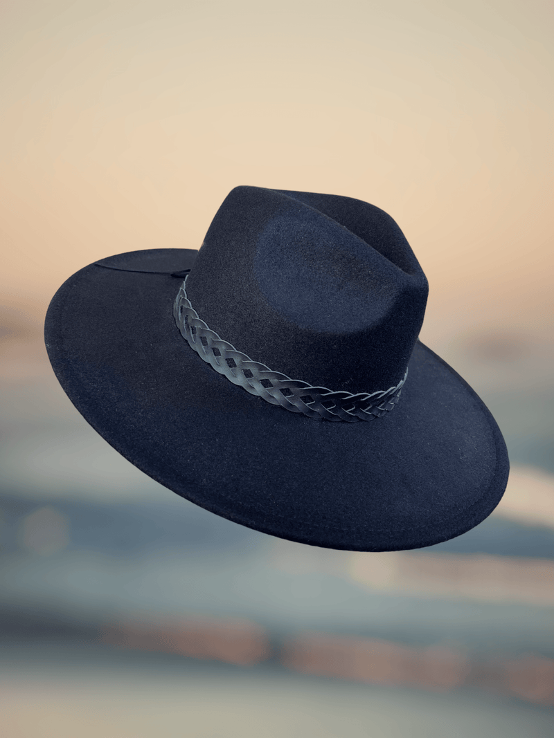Stylish Mesa Hat, offering a sophisticated silhouette to complement any ensemble with grace.