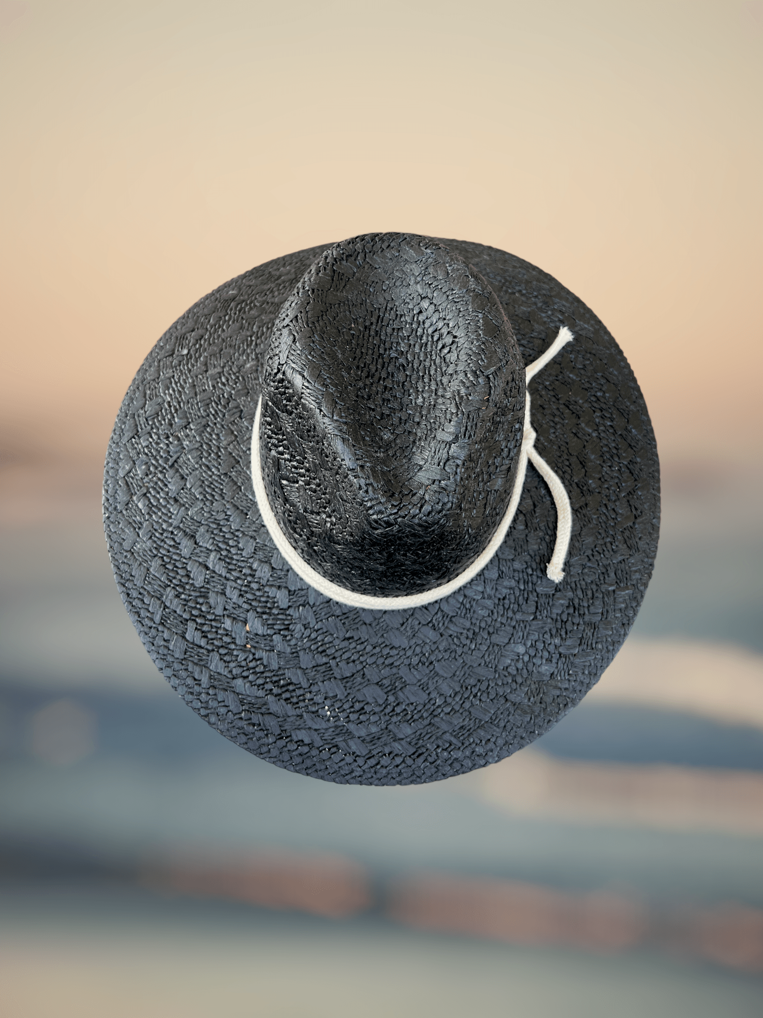 Elegant Tradition Hat, embodying a rich heritage of style through its classic design and utility.