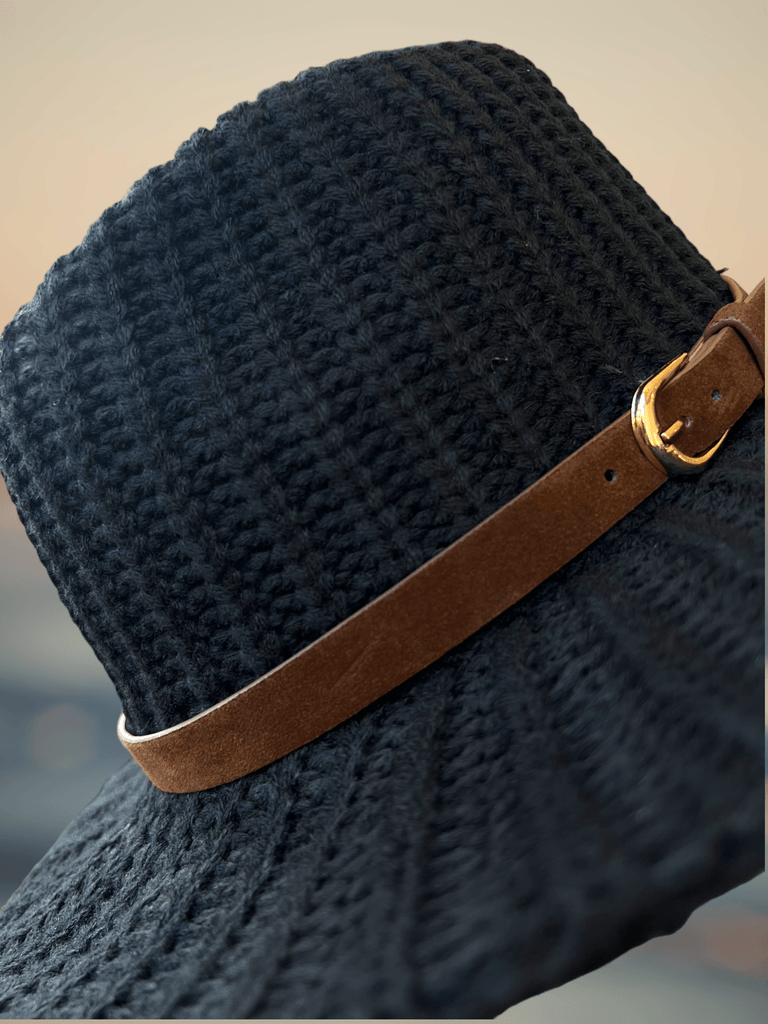 Warm Knit Hat showcasing finely crafted knit patterns, a cozy addition to your winter wardrobe.