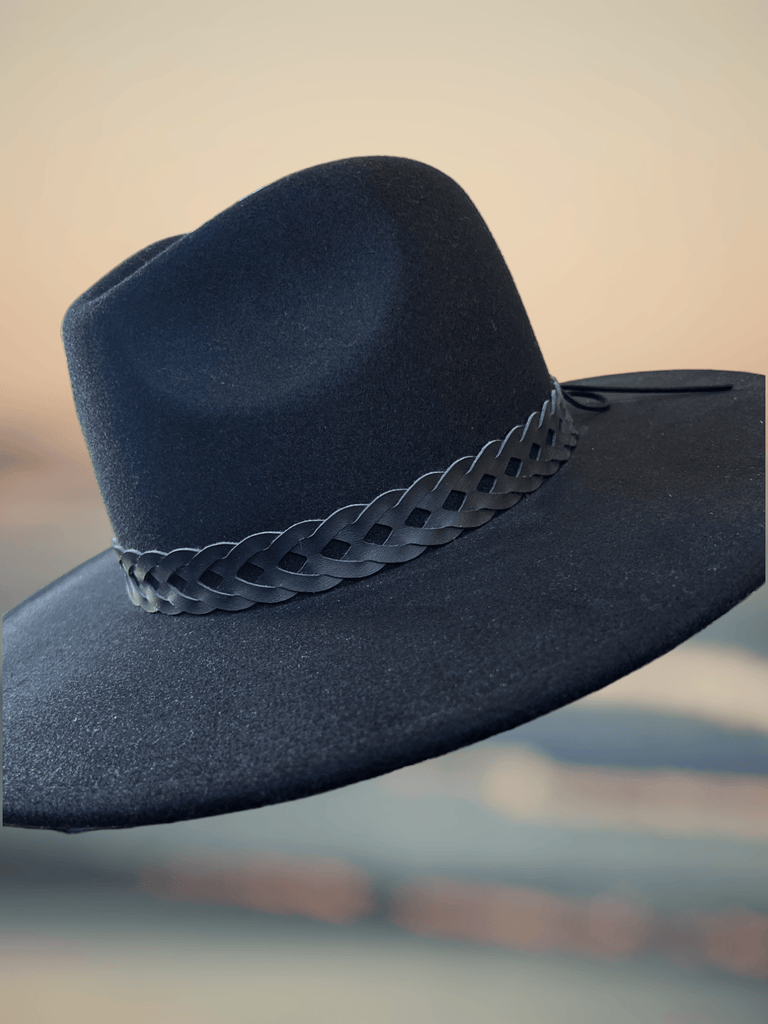 Stylish Mesa Hat, offering a sophisticated silhouette to complement any ensemble with grace.