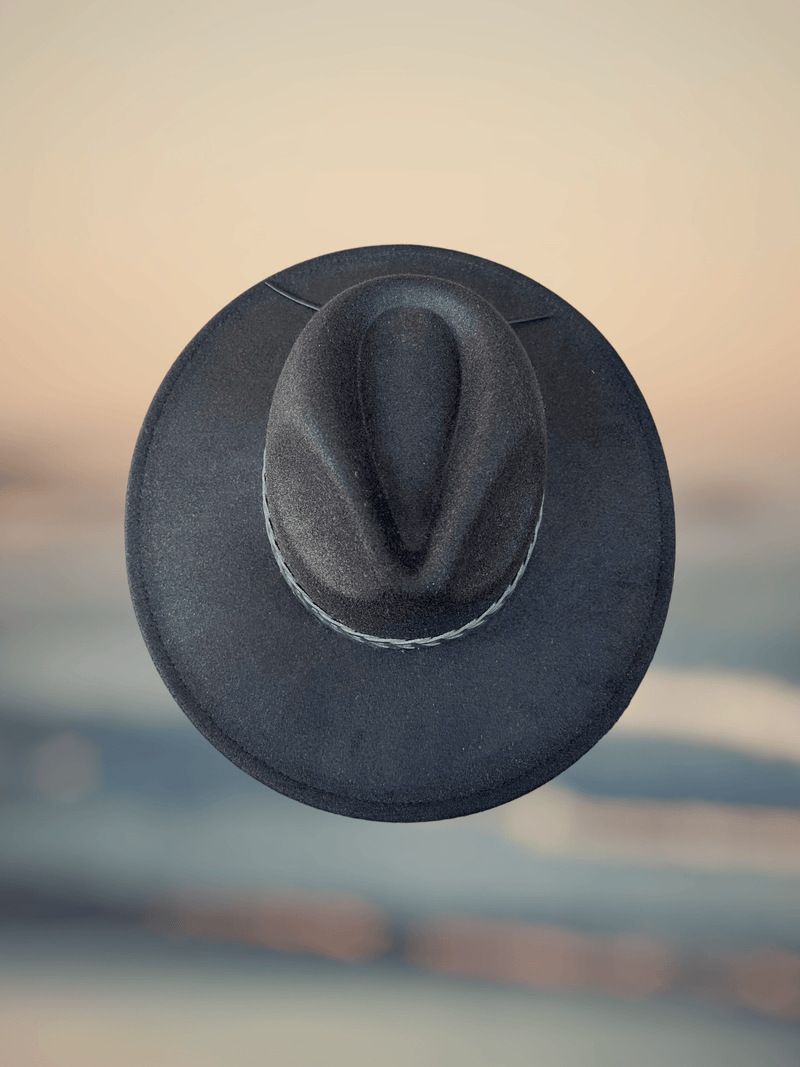 Stylish Mesa Hat, offering a sophisticated silhouette to complement any ensemble with grace.