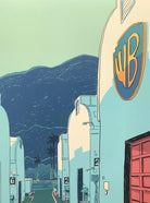 Warner Bros. Studio Illustration Print: Artistic depiction of the renowned studio in captivating blue tones, featuring the iconic water tower and historic sound stages, evoking the magic of Hollywood.