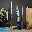 ellow Spiral Taper Candles, beautifully twisted, giving off a warm, bright light.