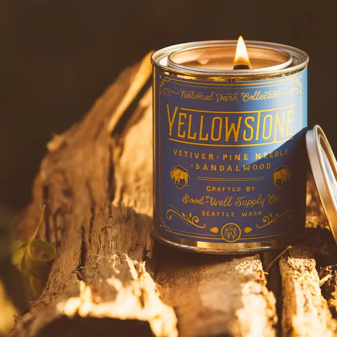 Yellowstone Soy Candle in sustainable packaging, diffusing a captivating scent reflective of the park's diverse landscapes.