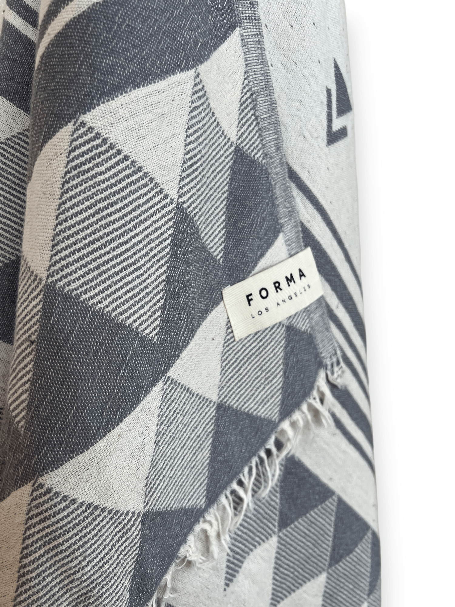 A set of Forma Towels from the Yosemite Collection, showing their soft, absorbent texture, suitable for beach or home use.