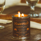 Yosemite Soy Candle in sustainable packaging, releasing a fresh, natural scent evocative of the iconic national park.