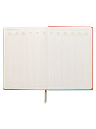 Image showcasing the 'Good Things Cloth Covered Journal', with an attractive fabric cover design.