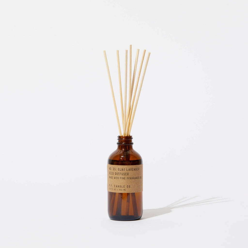 P.F. Candle Co Ojai Lavender Diffuser - Glass bottle with lavender scent diffuser sticks.