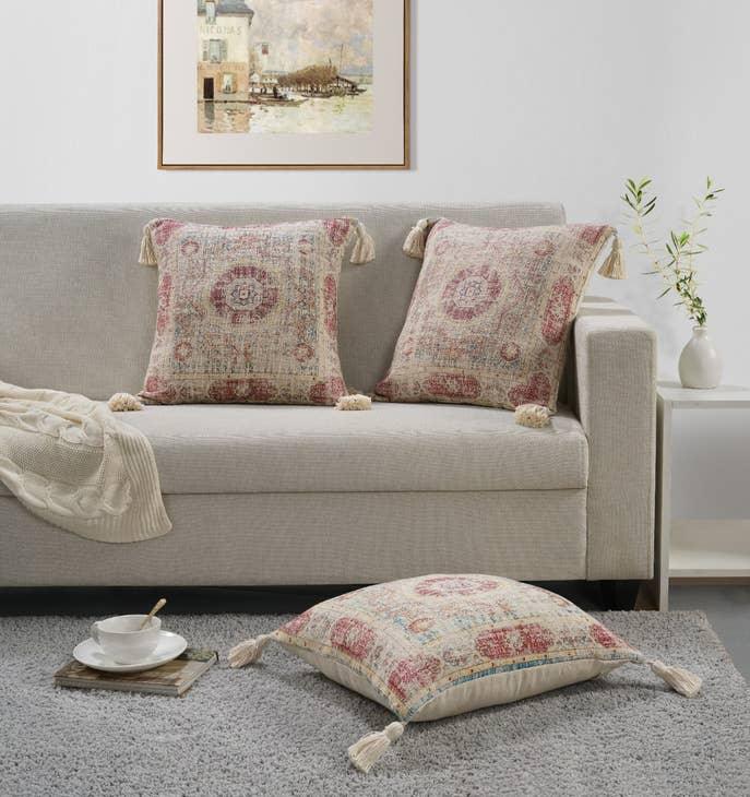 Image of the 'Handmade Printed Persian Cotton Pillow Cover', highlighting its soft, fluffy texture, the handmade tassels at each corner, and the intricate printed design.