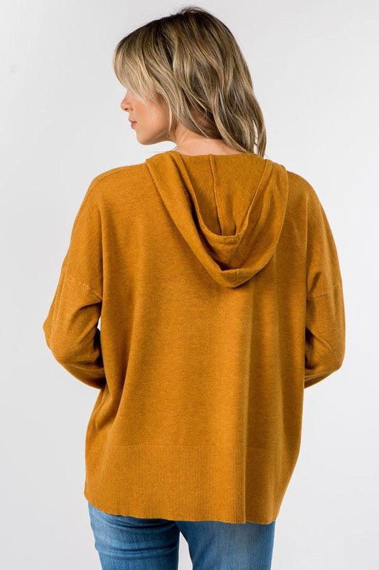 Sydney Hooded Sweater showcasing its comfortable fabric blend and trendy hooded design, perfect for a cozy and stylish look.