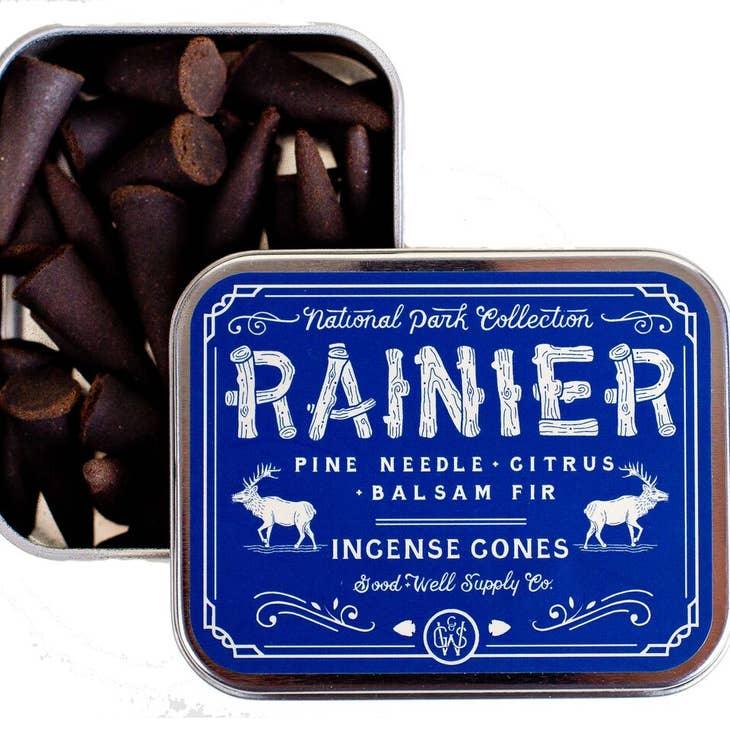 Rainier Incense sticks presented against the majestic Mount Rainier, embodying the product's crisp, fresh fragrance.