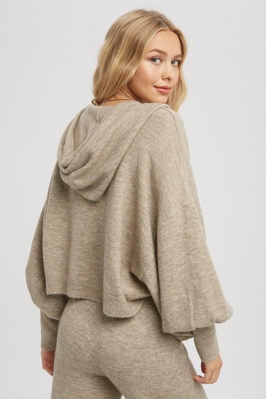 Hooded Pullover Sweater - A versatile and cozy sweater with a hood for extra warmth.