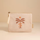 'Palma Corduroy Pouch' made from soft corduroy, featuring a palm leaf design