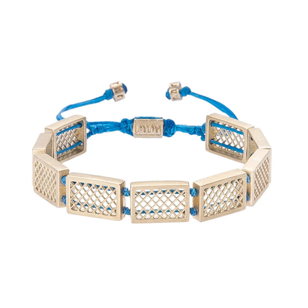 Grate Bracelet - A captivating blend of intricate design and vibrant blue charm.
