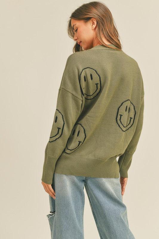 Patterned Smiley Sweater - Cozy knit with playful smiley face pattern. Embrace comfort and style with this whimsical and joyful sweater.