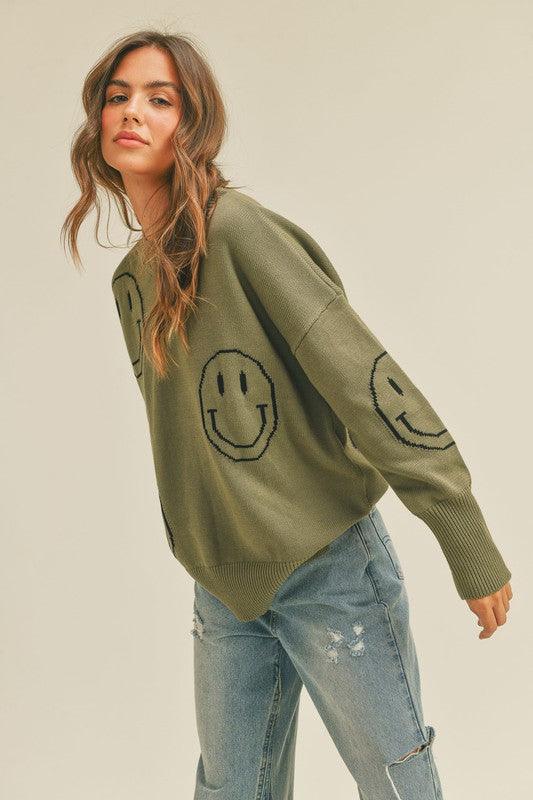 Patterned Smiley Sweater - Cozy knit with playful smiley face pattern. Embrace comfort and style with this whimsical and joyful sweater.