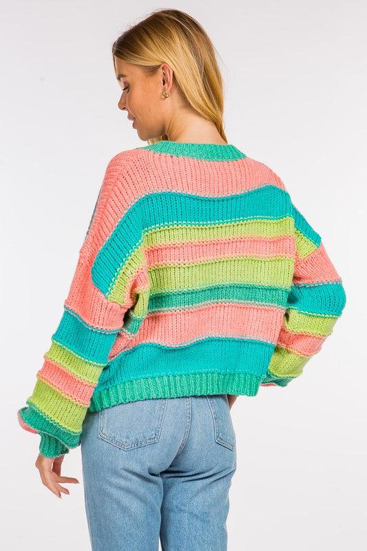 Candy Sweater featuring vibrant colors and a soft, comfortable fabric, perfect for adding a splash of color to any outfit.