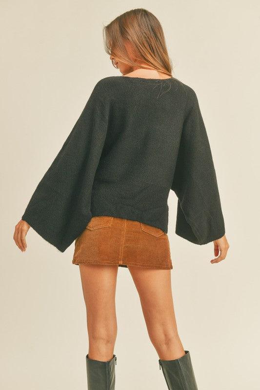 Wide Sleeve Sweater - Cozy knit with trendy wide sleeves. Embrace comfort and style in this modern and chic winter essential.