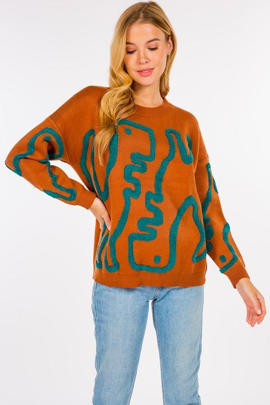 Dinosaur Sweater featuring cute dinosaur motifs on a comfortable, warm fabric, perfect for adding a fun element to your outfit.