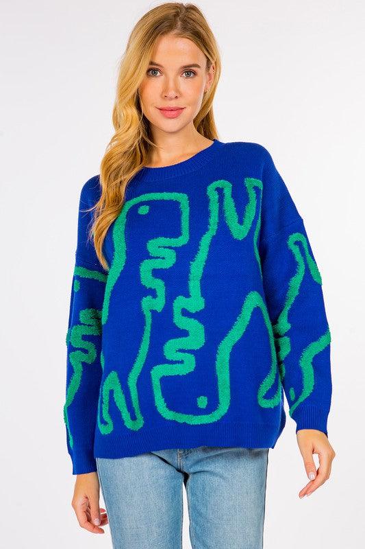 Dinosaur Sweater featuring cute dinosaur motifs on a comfortable, warm fabric, perfect for adding a fun element to your outfit.