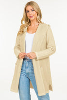 Calvin Cardigan showcasing its classic design and soft fabric, an ideal addition to any wardrobe for warmth and style.