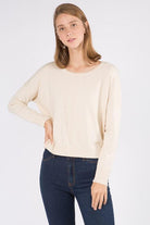 Sarah Sweater showcasing its luxurious fabric blend and versatile design, perfect for a sophisticated and comfortable look.