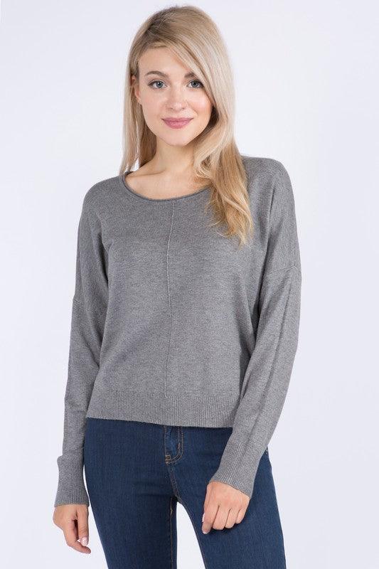 Sarah Sweater showcasing its luxurious fabric blend and versatile design, perfect for a sophisticated and comfortable look.