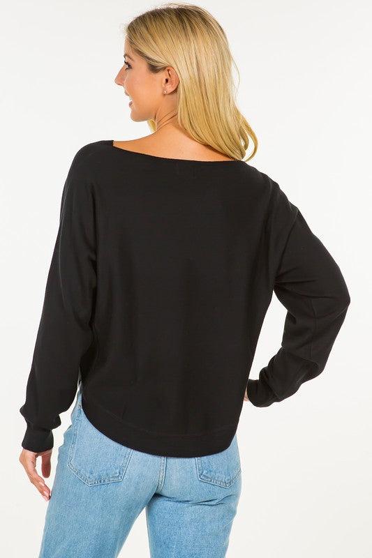 Crescent Sweater, showcasing a stylish crescent moon design on a soft, comfortable fabric, ideal for cool, cozy evenings.