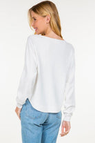 Crescent Sweater, showcasing a stylish crescent moon design on a soft, comfortable fabric, ideal for cool, cozy evenings.