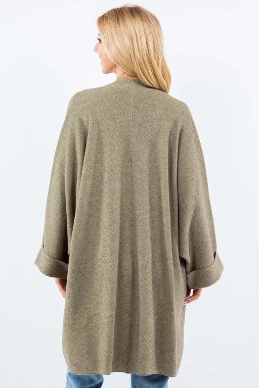Olivia Cardigan showcasing its open-face design, lightweight knit fabric, and ribbed detailing, ideal for effortless and stylish layering.
