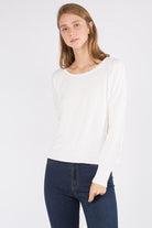 Sarah Sweater showcasing its luxurious fabric blend and versatile design, perfect for a sophisticated and comfortable look.