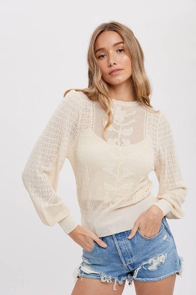 Pointelle Knit Top - A delicate and feminine knit top with intricate pointelle stitching, perfect for versatile and timeless style.
