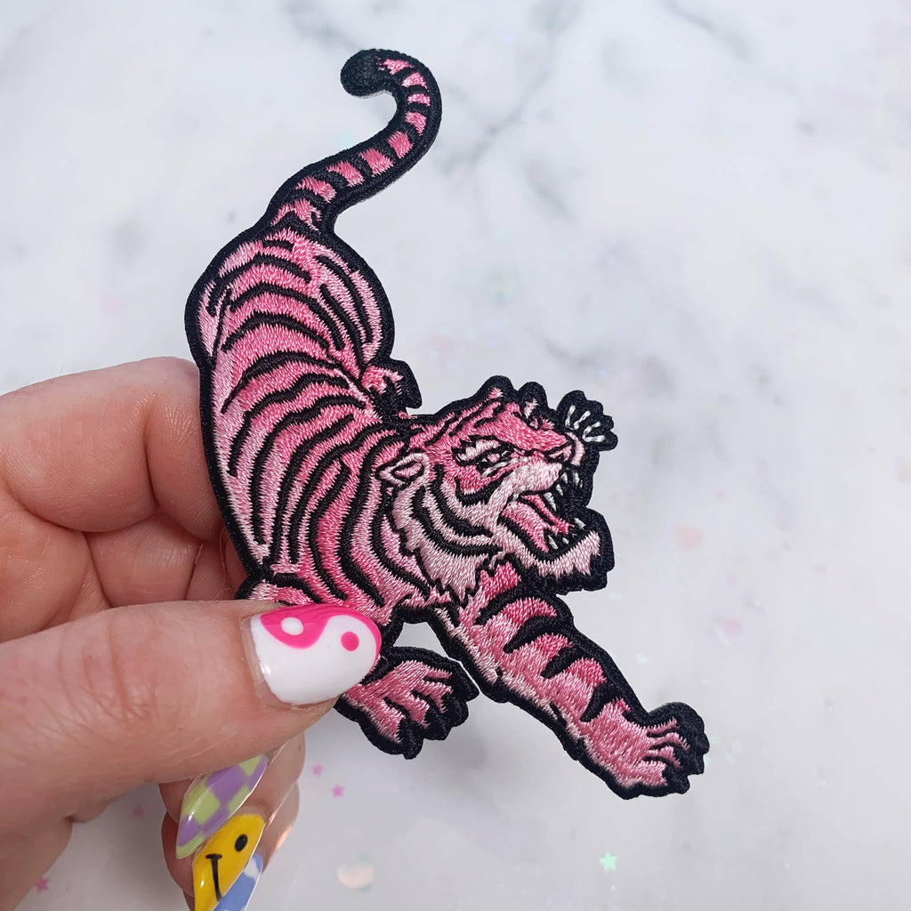Large pink embroidered tiger patch with intricate detailing.