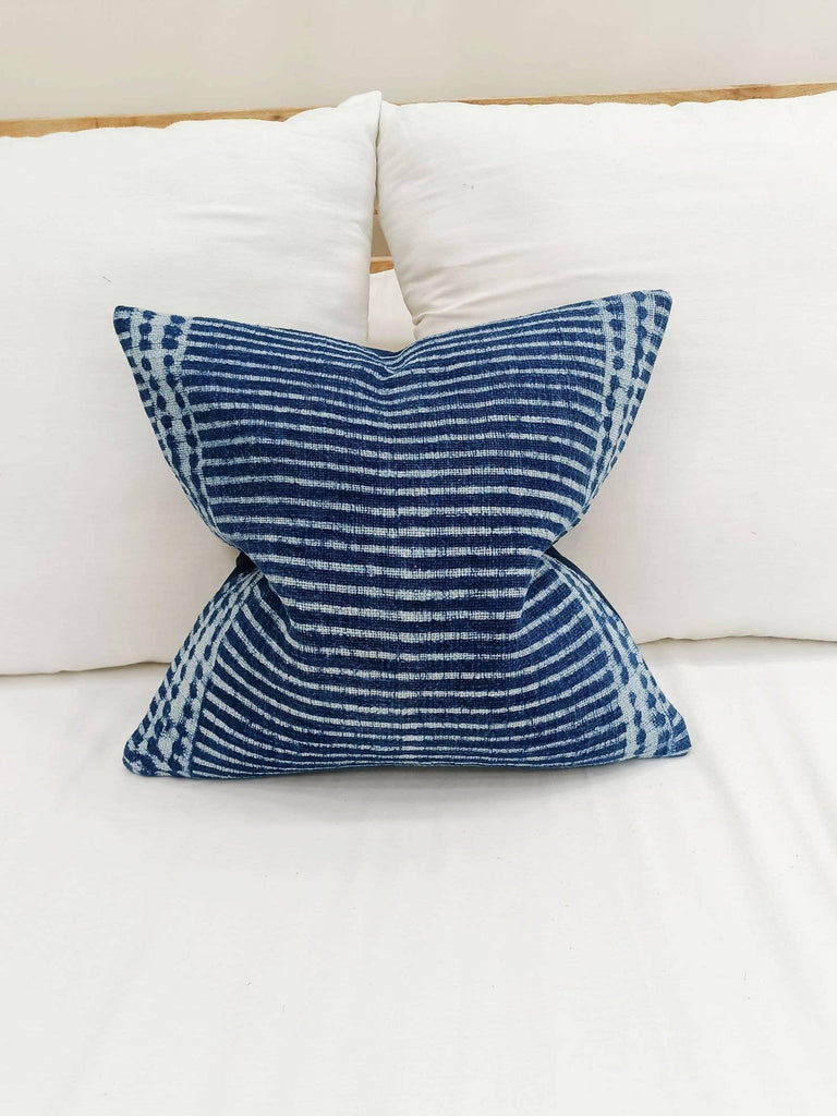 Image of the 'Indigo Blue Square Pillow Cover', showcasing its vibrant indigo color and fine cotton material, designed by Indian master artisans.