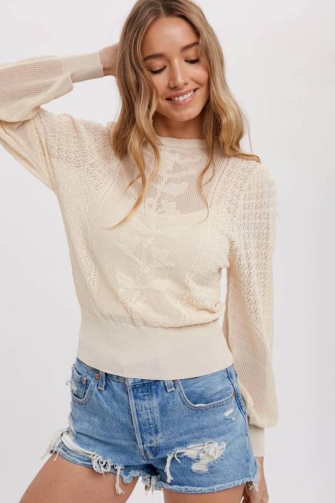 Pointelle Knit Top - A delicate and feminine knit top with intricate pointelle stitching, perfect for versatile and timeless style.