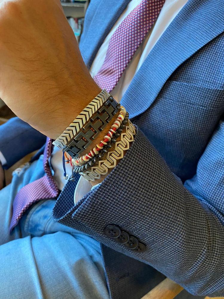 Roof Bracelet: A modern masterpiece inspired by architectural elegance.