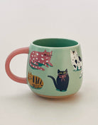 FORMA Ceramic Cats Mug - Whimsical cat illustrations for charming coffee moments.