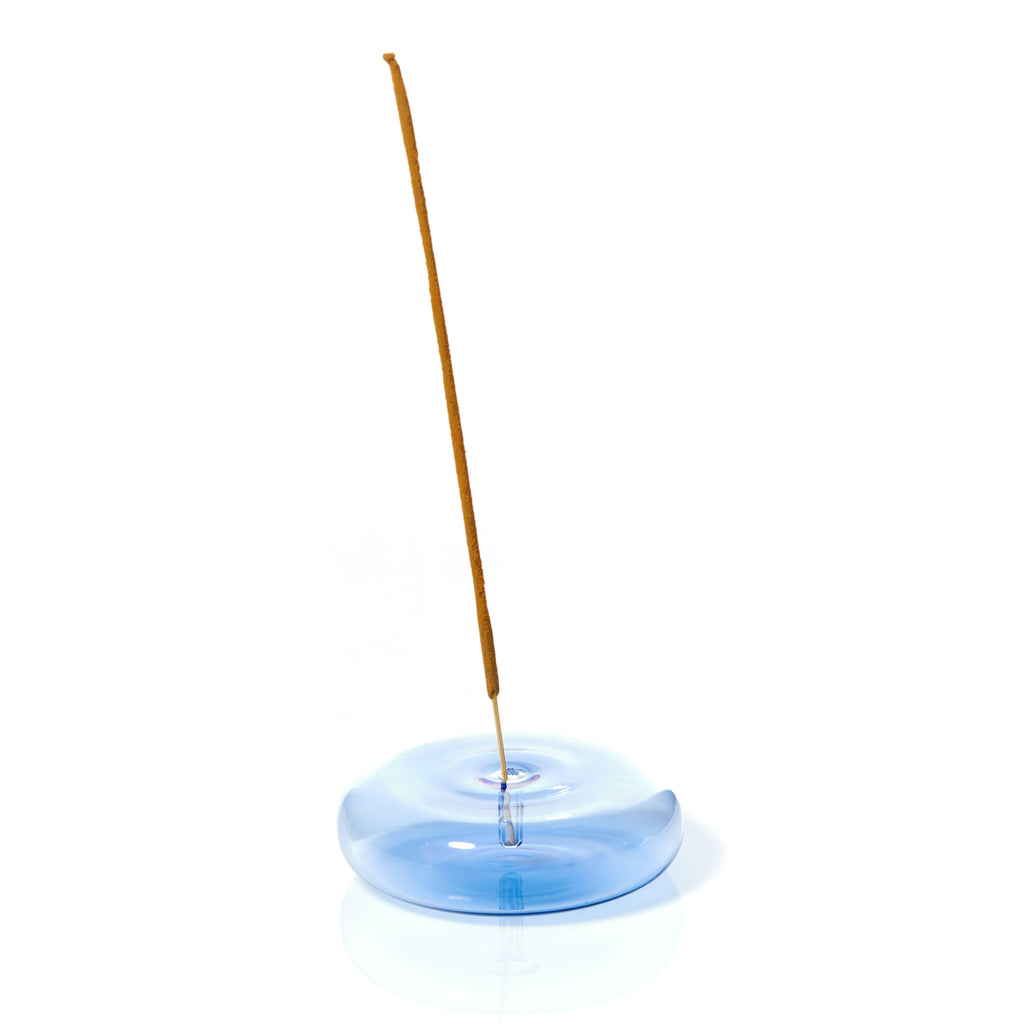 Blue Dimple Hand Blown Glass Incense Holder reflecting light beautifully.
