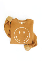 Smiley Face Sweater: Yellow sweater with a large smiley face design.
