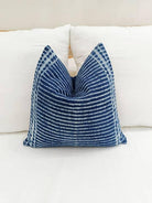 Image of the 'Indigo Blue Square Pillow Cover', showcasing its vibrant indigo color and fine cotton material, designed by Indian master artisans.