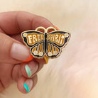 Free Spirit Butterfly Enamel Pin, featuring a detailed, radiant butterfly design, signifying transformation and unbridled freedom.