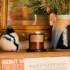 Spruce Soy Candle in sustainable packaging, releasing a fresh, revitalizing spruce forest scent.