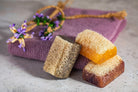 Lemon-scented Natural Handmade Loofah Soap Bar, perfect for refreshing exfoliation.