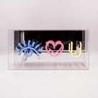 FORMA's Neon "Eye Love You" Lights in blue, red, and yellow, illuminating an affectionate message in a stylish way.