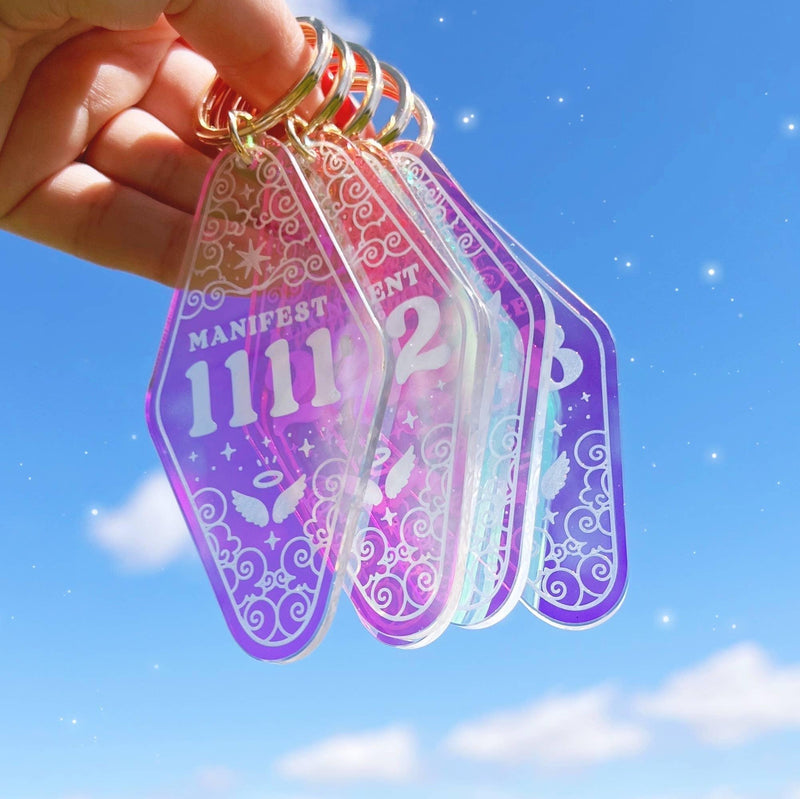Angel Number Motel Keychain, combining symbolic angel numbers with a nostalgic motel key design.