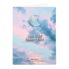 Greeting card with a moonstone crescent moon charm and ‘Stay Wild Moon Child’ text against a dreamy sky background.