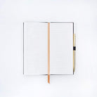 Image showcasing the 'Deep Dark Secrets Notebook', featuring an elegant, dark cover.